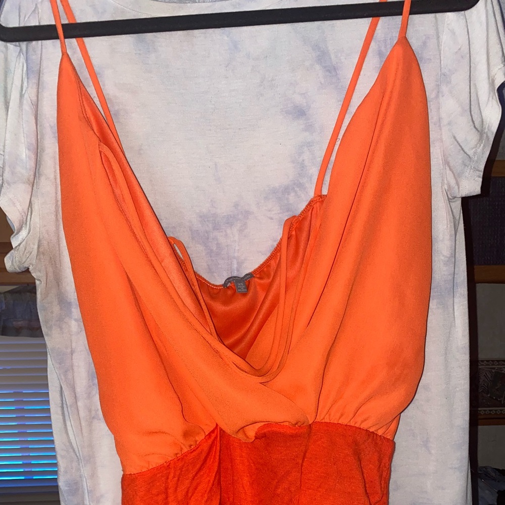 Orange body suit